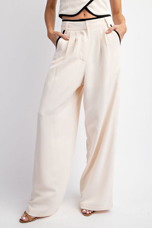 CREAM WITH BLACK PANTS